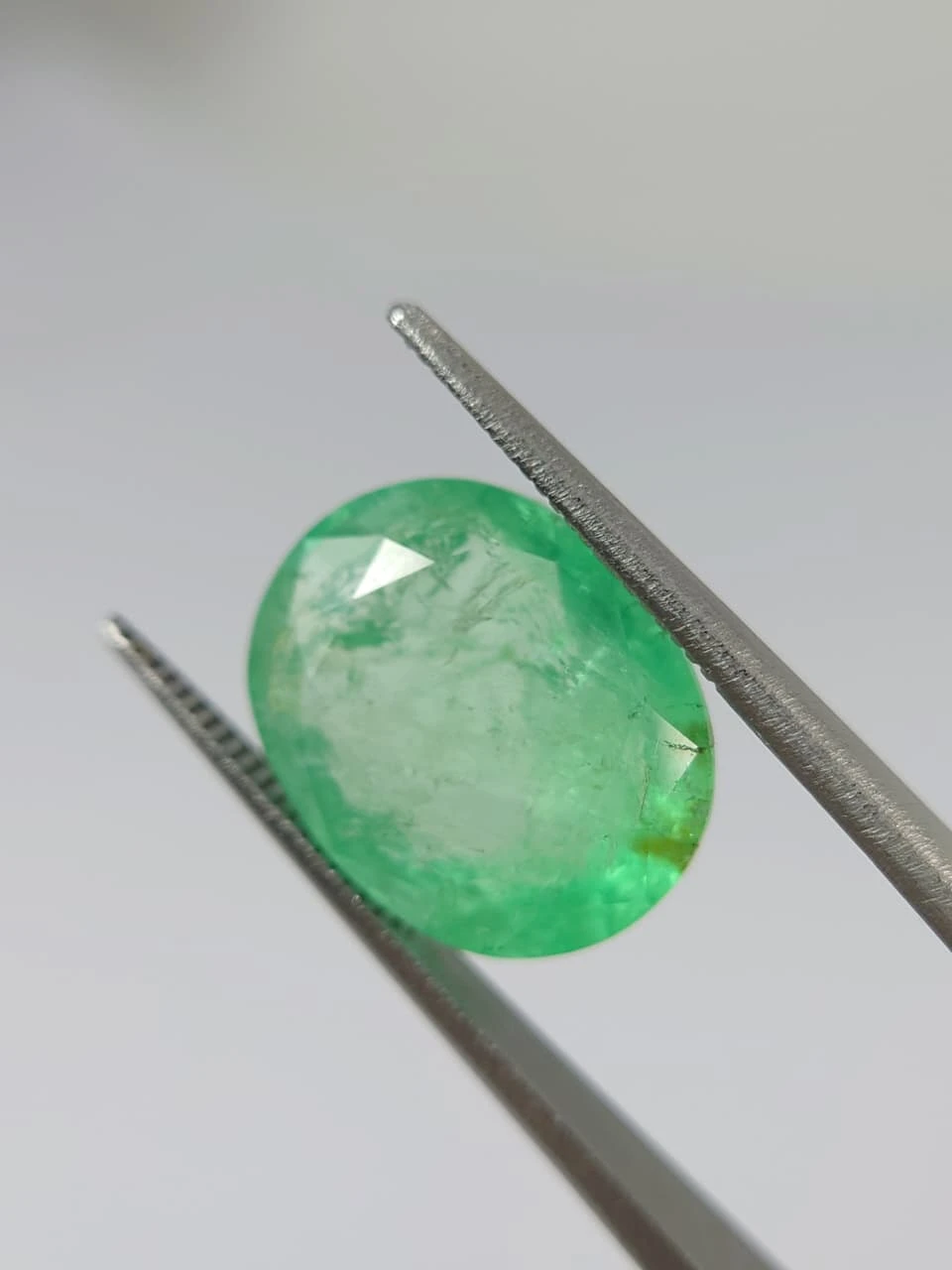 7.7ct Oval Faceted Minor Oiled Panjshir Emerald from Afghanistan — view 5